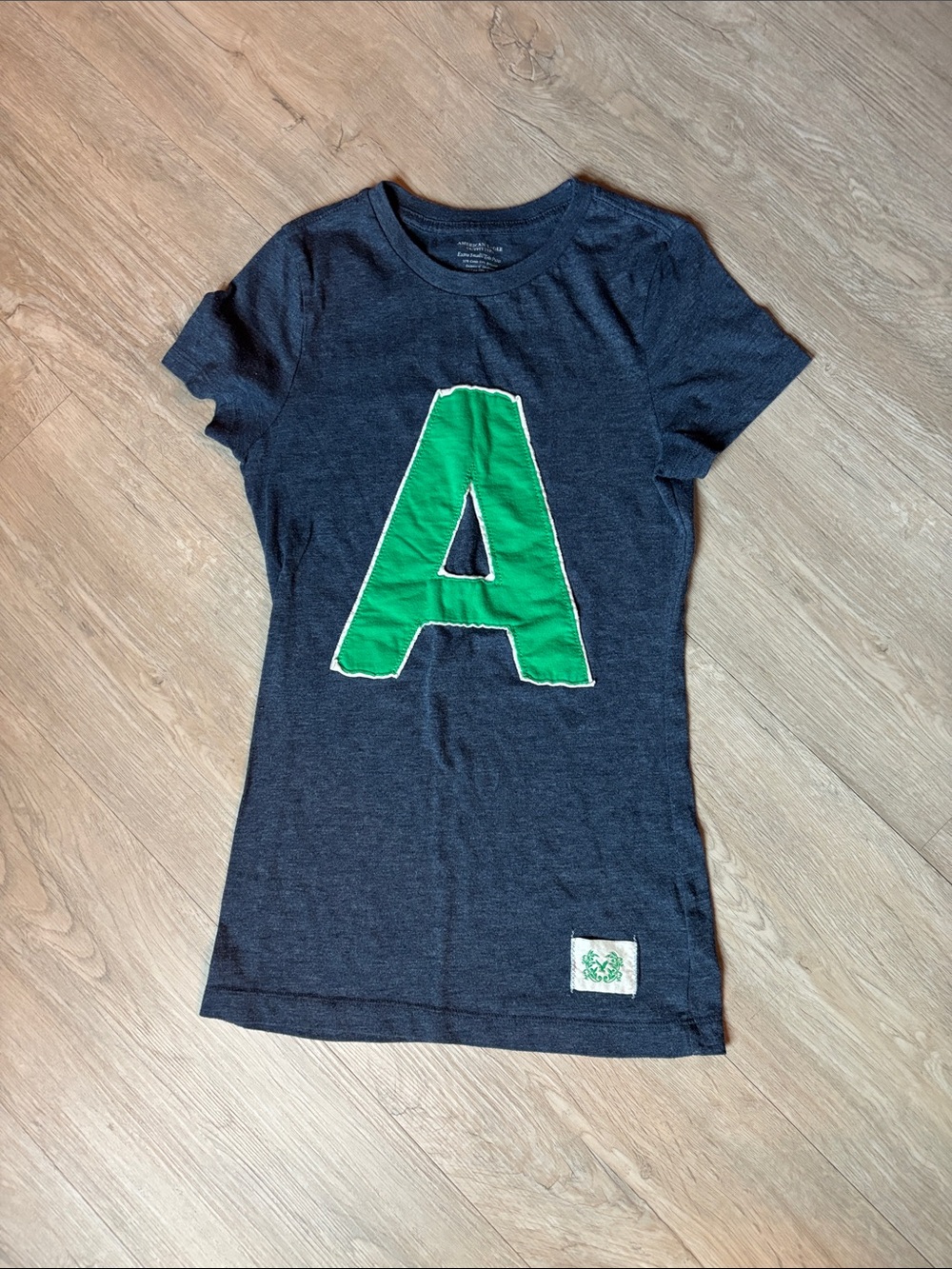American Eagle Outfitters Navy Tee with Green 'A' Applique